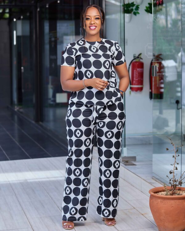 Two piece white and black polka top and trouser 